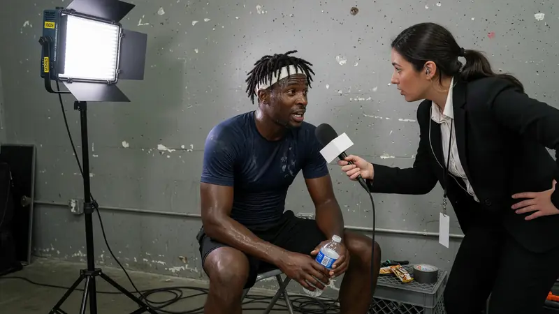 Player interview corner in a bright media mixed zone